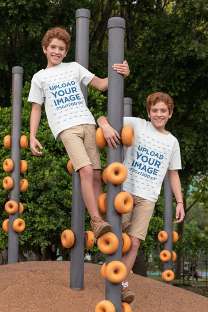 Mockup of Two Twins at a Playground Wearing T-Shirts 
