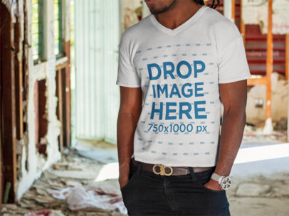 V-Neck T-Shirt Mockup Featuring a Young Man in a Construction Site