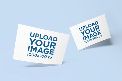 Mockup of Two Horizontal Flyers Floating on a Plain Backdrop 1117 el1