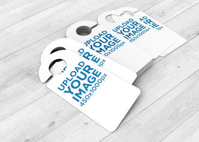 Mockup of a Bunch of Door Hangers Placed over a Wooden Surface