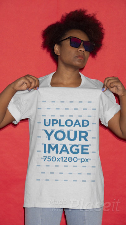 Vertical Video of a Cool Woman Showing of Her T-Shirt