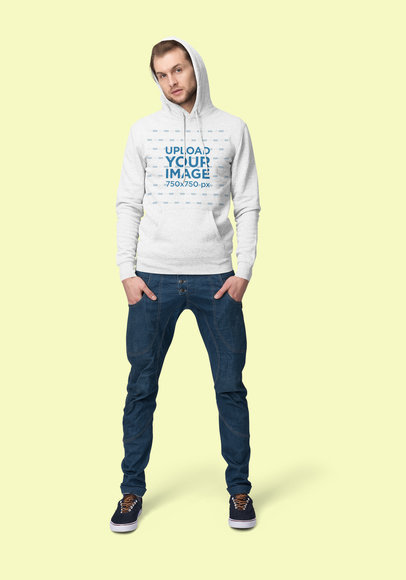 Mockup of a Man in a Hoodie at a Studio