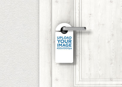 Mockup of a Door Hanger Placed on a Wooden-Texture Door