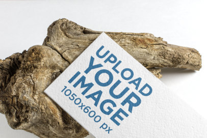 Logo Mockup of a Business Card Placed on a Piece of Wood 1672-el
