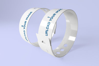 Mockup of Two Vinyl Wristbands Placed inside a Minimalistic Scenery