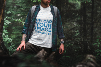 Mockup of a Man Wearing a Tee in a Forest Scenery 1853-el1