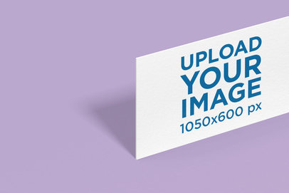 Mockup of a Business Card Standing on a Customizable Surface