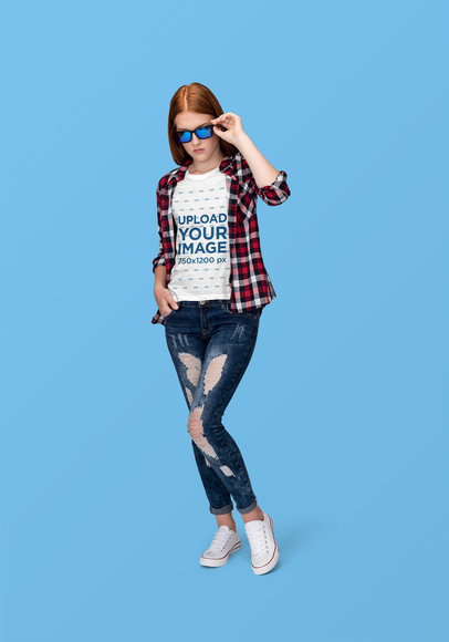 T-Shirt Mockup Featuring a Woman with Sunglasses at a Studio