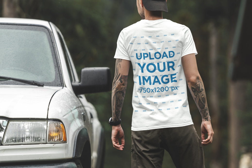 Back View Mockup of a Man Wearing a T-Shirt by a Truck 