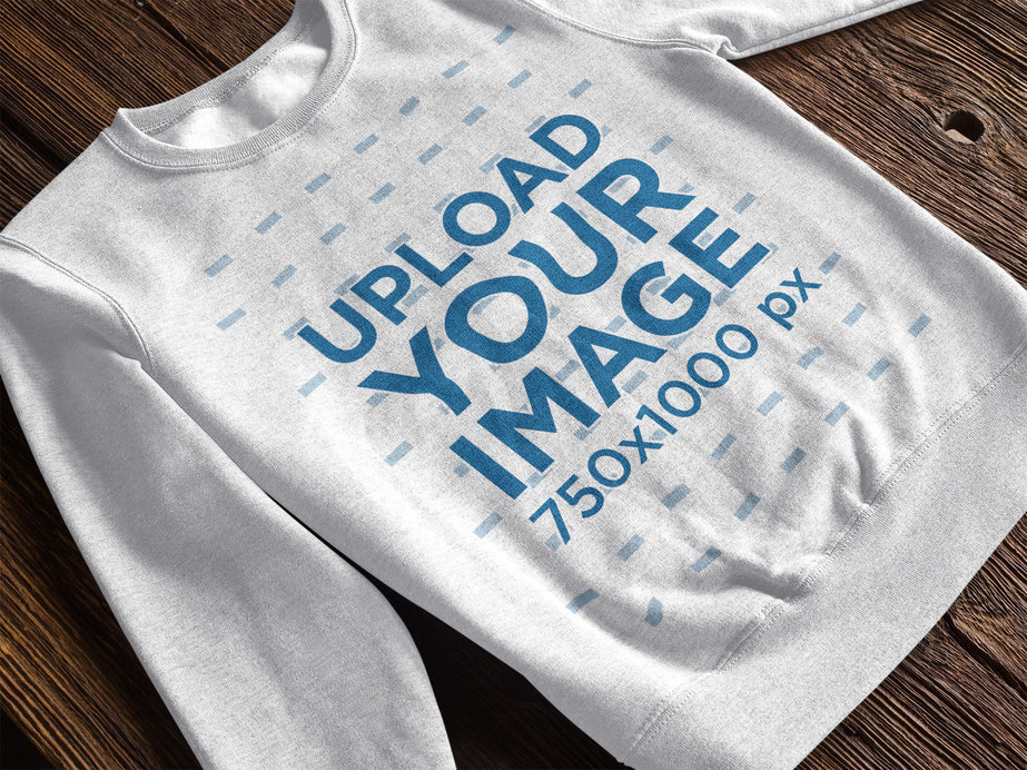Crew Neck Sweatshirt Mockup Over a Wooden Table