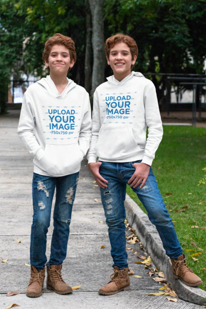 Pullover Hoodie Mockup of Identical Twins Wearing Matching Outfits