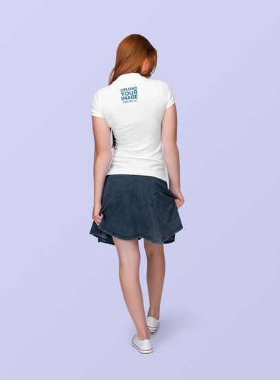 Polo Shirt Mockup of a Woman with a Denim Bottom at a Studio