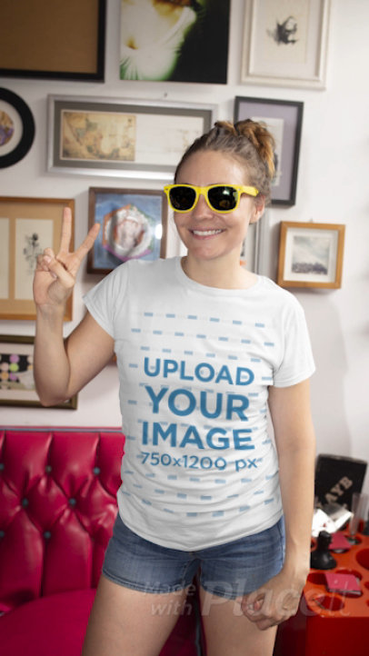 T-Shirt Video of a Woman with Sunglasses Posing in a Kitsch Living Room