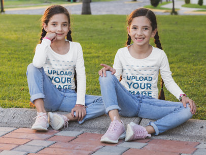 Mockup of Two Sisters with Long Sleeve Tees at a Park 