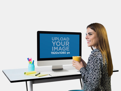Mockup of a Woman Working on Her iMac While Drinking Coffee