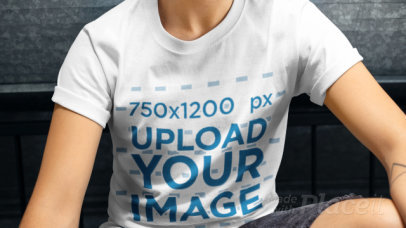 Stop Motion T-Shirt Video Featuring a Young Man Posing Against a Metallic Wall 22462