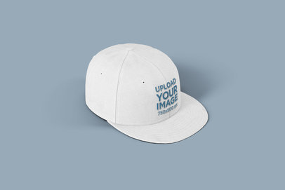 Mockup of a Customizable Snapback Hat on a Flat Surface 