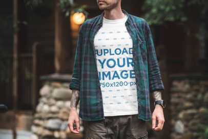 Mockup of a Tattooed Man Wearing a T-Shirt Outside 