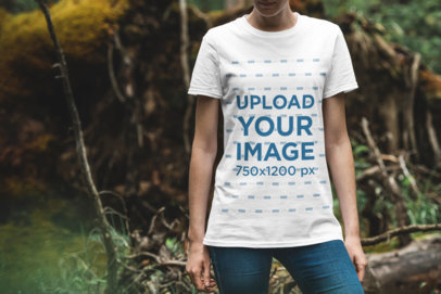 T-Shirt Mockup Featuring a Woman in the Woods