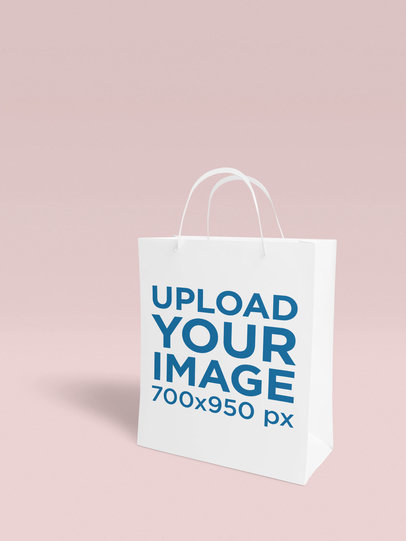 Gift Bag Mockup Featuring a Customizable Backdrop
