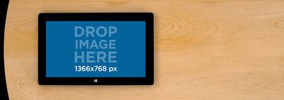 Microsoft Surface Over a Table Wide Shot Mockup