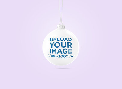 Mockup of a Christmas Ball Hanging in a Minimalistic Scenery