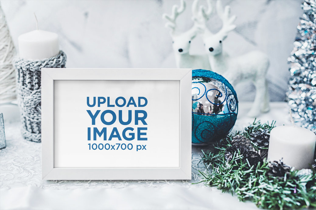 Mockup of an Art Print Surrounded by Christmas Ornaments