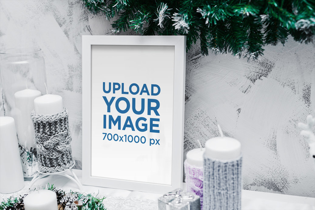 Mockup of an Art Print Surrounded by Christmas Candles 