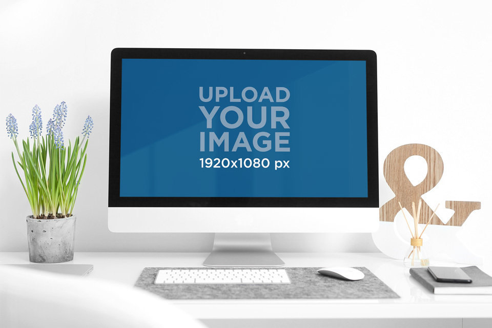 Mockup of an iMac on a Modern Desk 