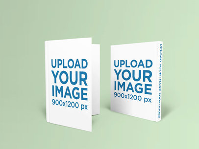 Mockup Featuring Two Hardcover Books Standing Against a Plain Color Backdrop 1523-el