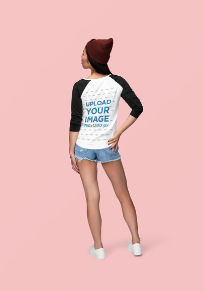 Back View Mockup of a Woman Wearing a Customizable Raglan Long Sleeve Tee 