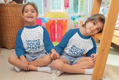 Mockup of Twin Girls Wearing Raglan Tees in Their Bedroom