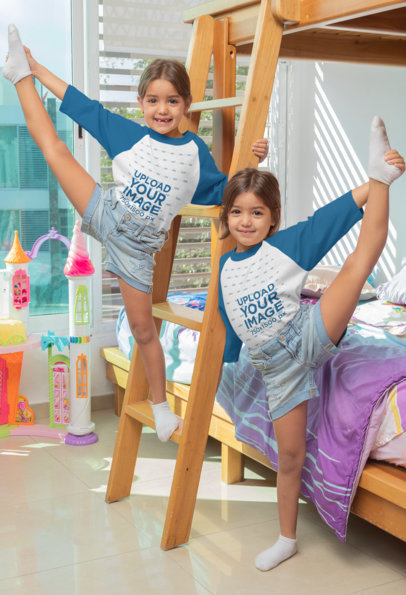 Raglan Tee Mockup Featuring Twin Girls Doing a Standing Split 