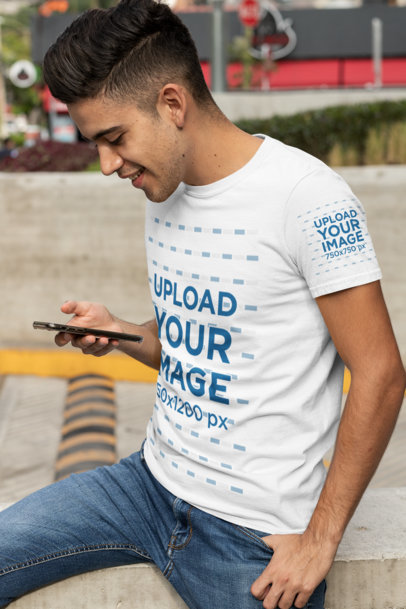 Mockup of a Young Man Wearing a T-Shirt with a Customizable Sleeve 