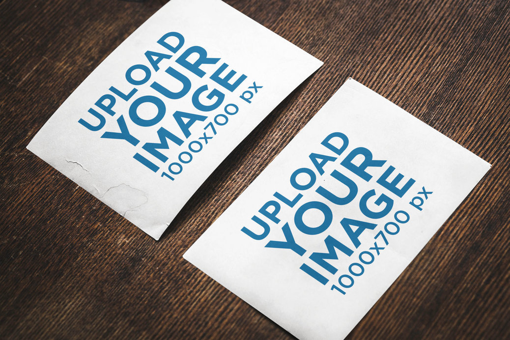 Placeit - Mockup of Two Horizontal Postcards on a Wooden Surface