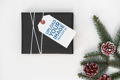 Mockup of a Brand Tag Attached to a Christmas Present 2087-el1