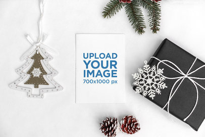 Mockup of a Greeting Card in a Minimalist Christmas Setting