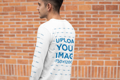 Long Sleeve Tee Mockup of a Man Posing in Front of a Brick Wall 