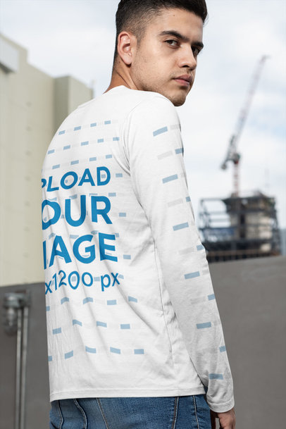 Back View Mockup of a Serious Man Wearing a Long Sleeve Tee 
