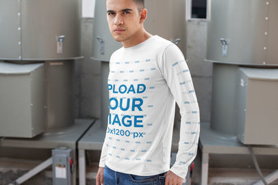 Long Sleeve T-Shirt Mockup of a Serious Man Against a Metal Structure 