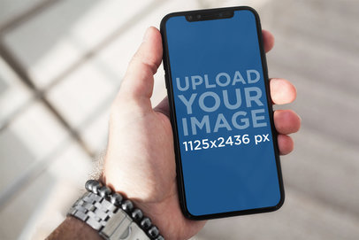 iPhone 11 Pro Mockup Featuring a Man Wearing a Watch