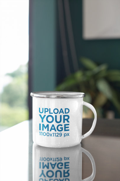 Mockup of a Customizable 12 oz Enamel Mug with a Silver Rim 