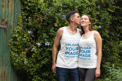 Tank Top Mockup of a Couple in the Garden 