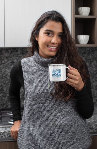 Mockup of a Woman Holding a 12 oz Silver Rim Enamel Mug in the Kitchen 