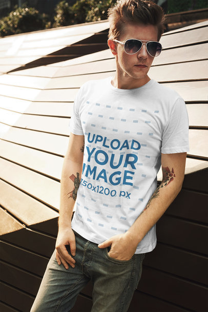 Tee Mockup of a Tattooed Man with Sunglasses