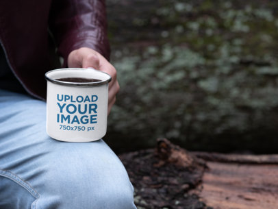 Mockup of a Man Holding a 12 oz Enamel Mug with Silver Rim 