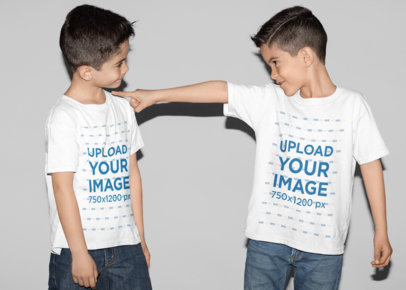 T-Shirt Mockup Featuring Twin Brothers Playing in a Studio