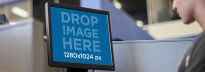 Desktop Mockup Featuring a Student at a Computer Lab