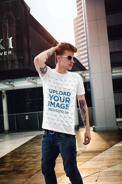 T-Shirt Mockup of a Tattooed Man with Swag 