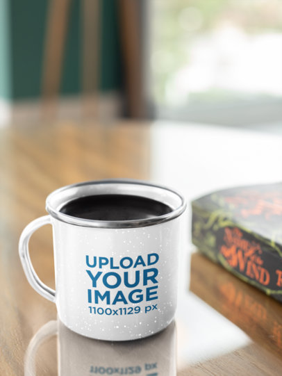 Mockup Featuring a 12 oz Silver Rim Enamel Mug Placed on a Wooden Table 